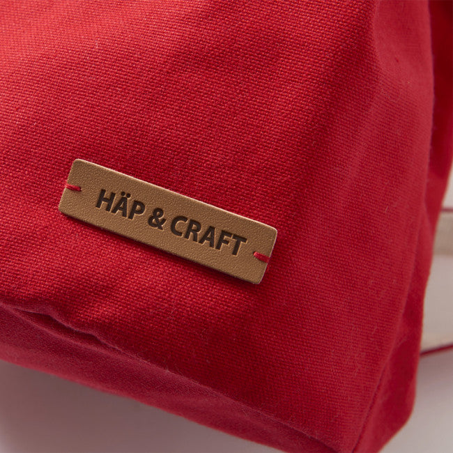 2WAY撥水バッグレッドとHAPCRAFTのロゴ